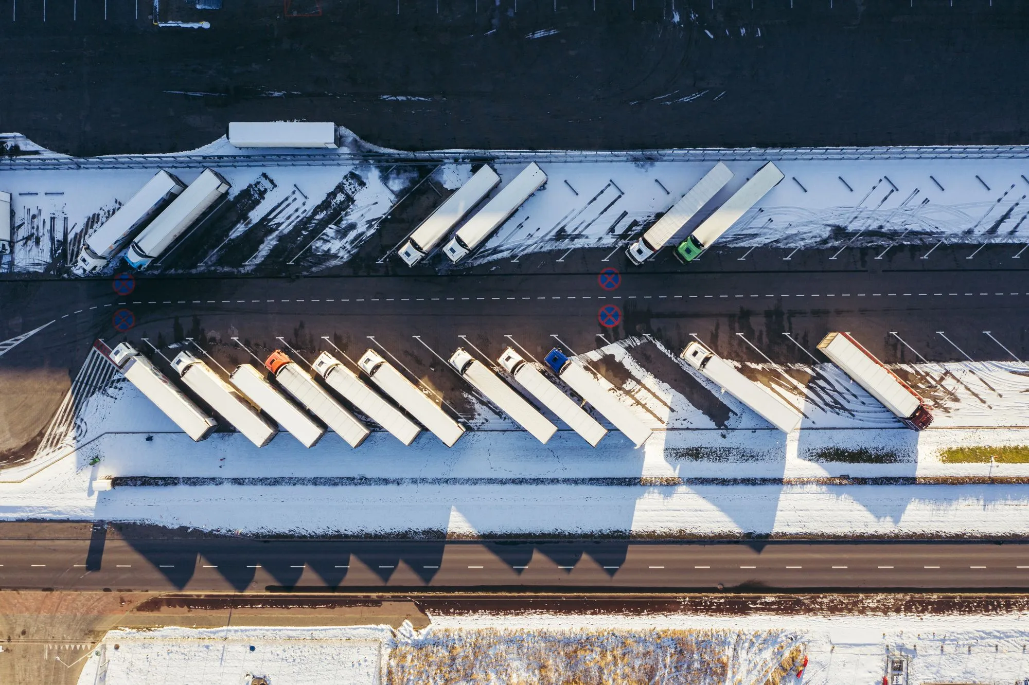 Trailers staged in rows across a yard, seen from above